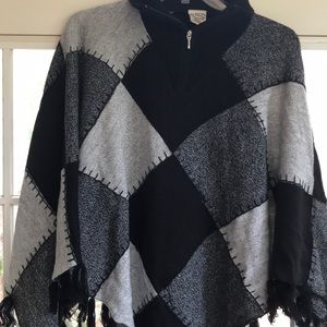 Alison Daley ribbed collared poncho with tassels